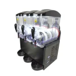 Four-head commercial soft-serve ice cream machine with transparent hoppers and black base.