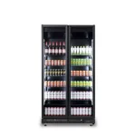 Double-door refrigerated display case full of assorted drinks on shelves with bottles and cans visible.