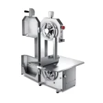 Commercial stainless steel meat slicer with a large circular blade and feed tray on a sturdy base.