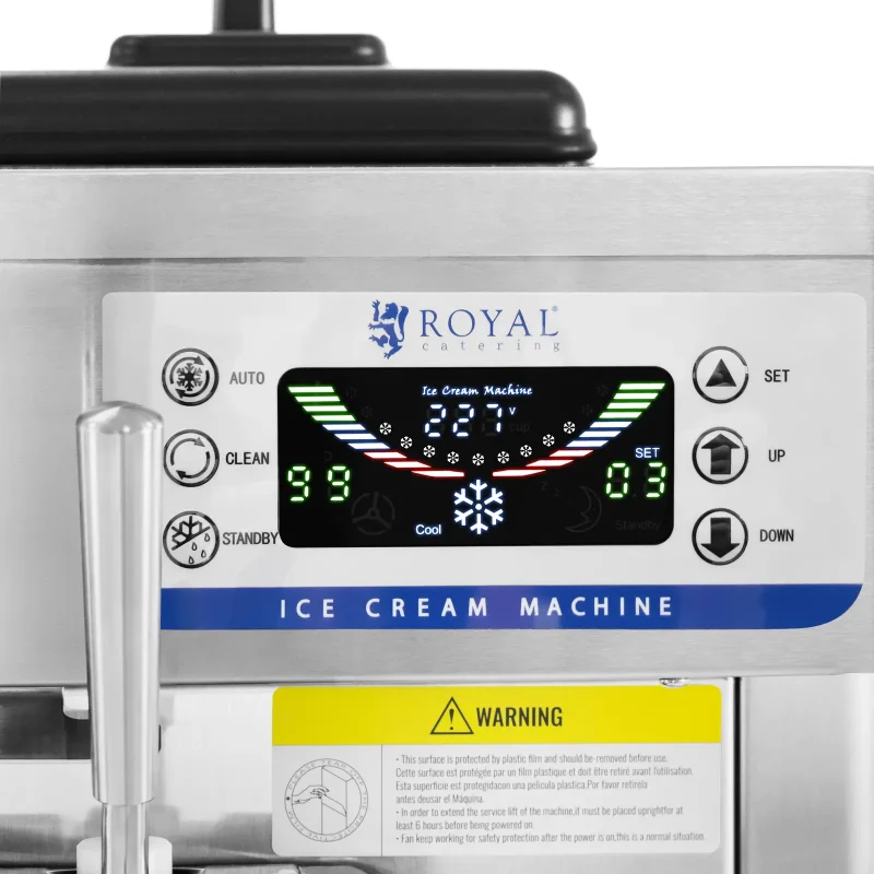 Royal Catering ice cream machine control panel with digital display and colorful gauges, showing temperature and status indicators.